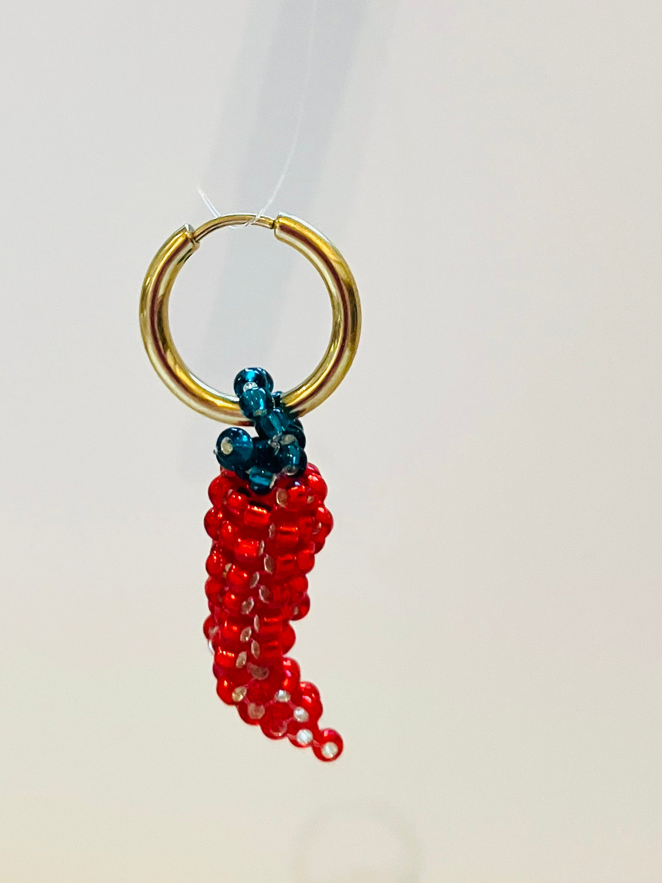 Handbeaded light red pepper earring