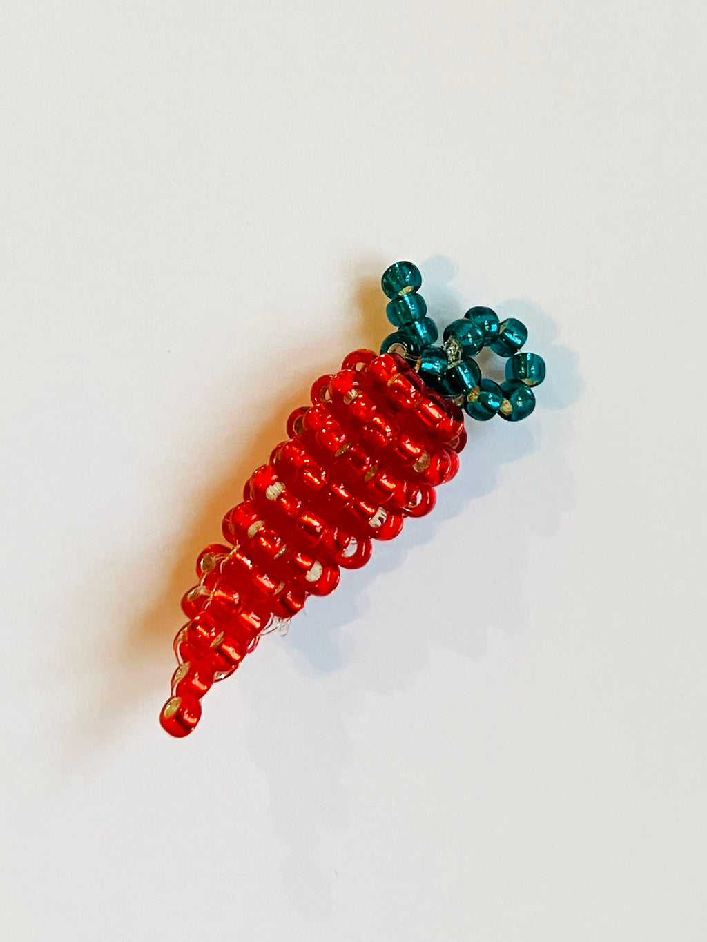 Handbeaded light red pepper earring